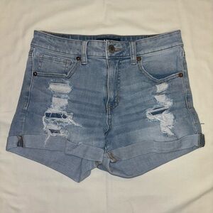 Blue ripped shorts